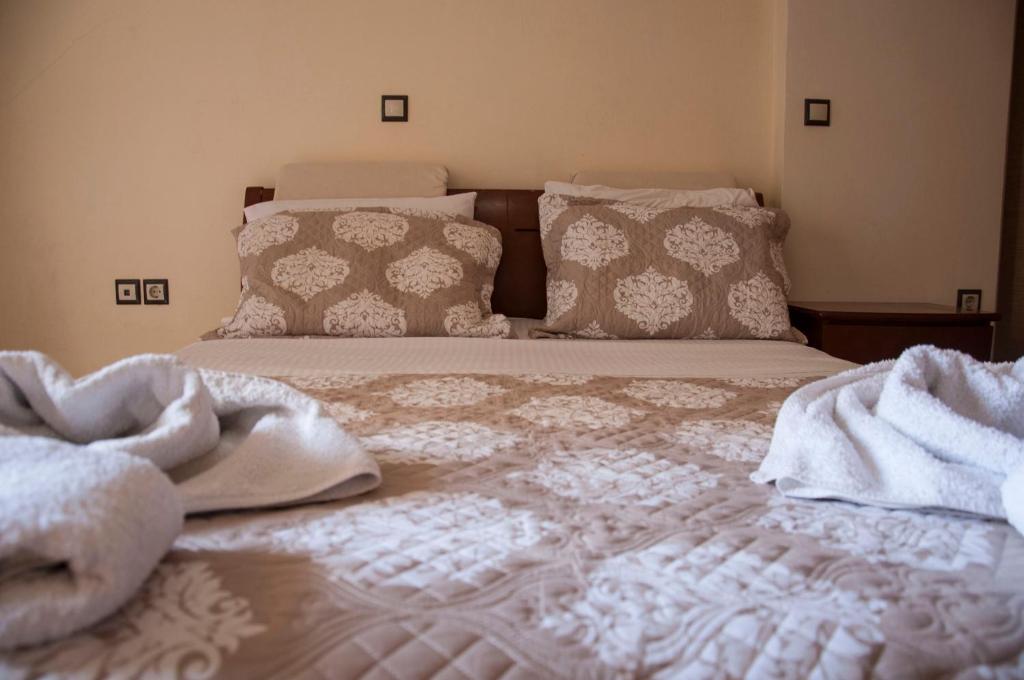 Postel nebo postele na pokoji v ubytování Minas-Maria House