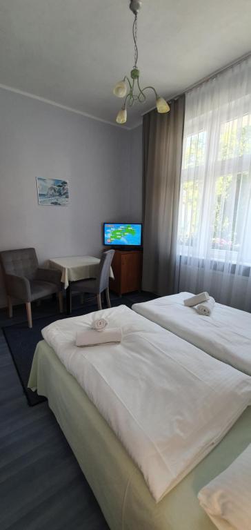 Posteľ alebo postele v izbe v ubytovaní Willa Meduza