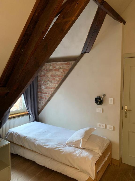 Letto o letti in una camera di Hotel Salvators