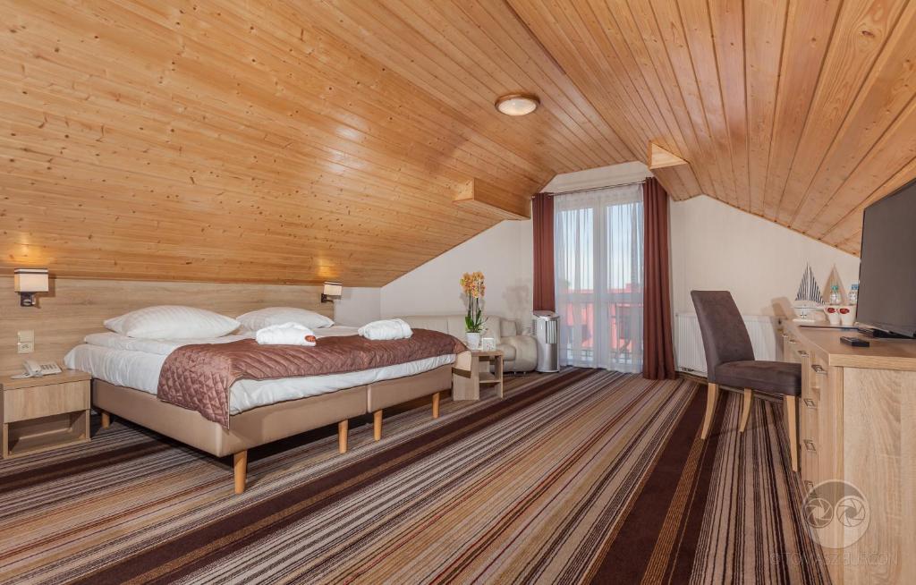 Posteľ alebo postele v izbe v ubytovaní Hotel SPA Activia