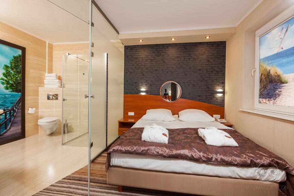 Posteľ alebo postele v izbe v ubytovaní Hotel SPA Activia