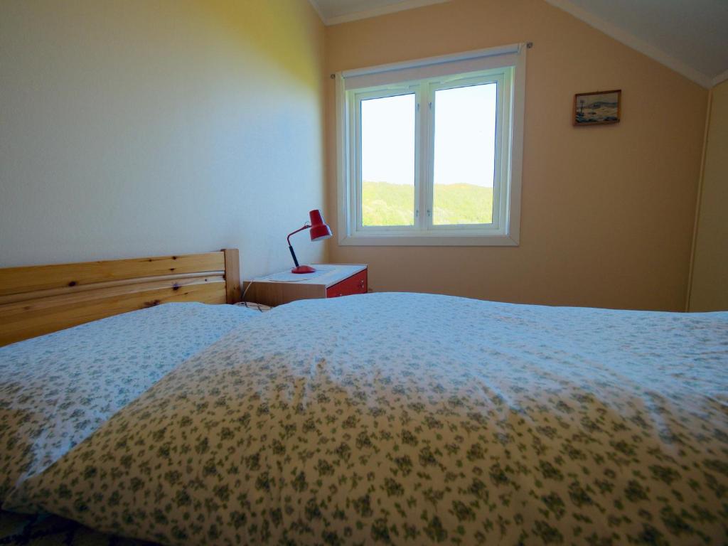 Postel nebo postele na pokoji v ubytování Ramberg Lodge Lofoten