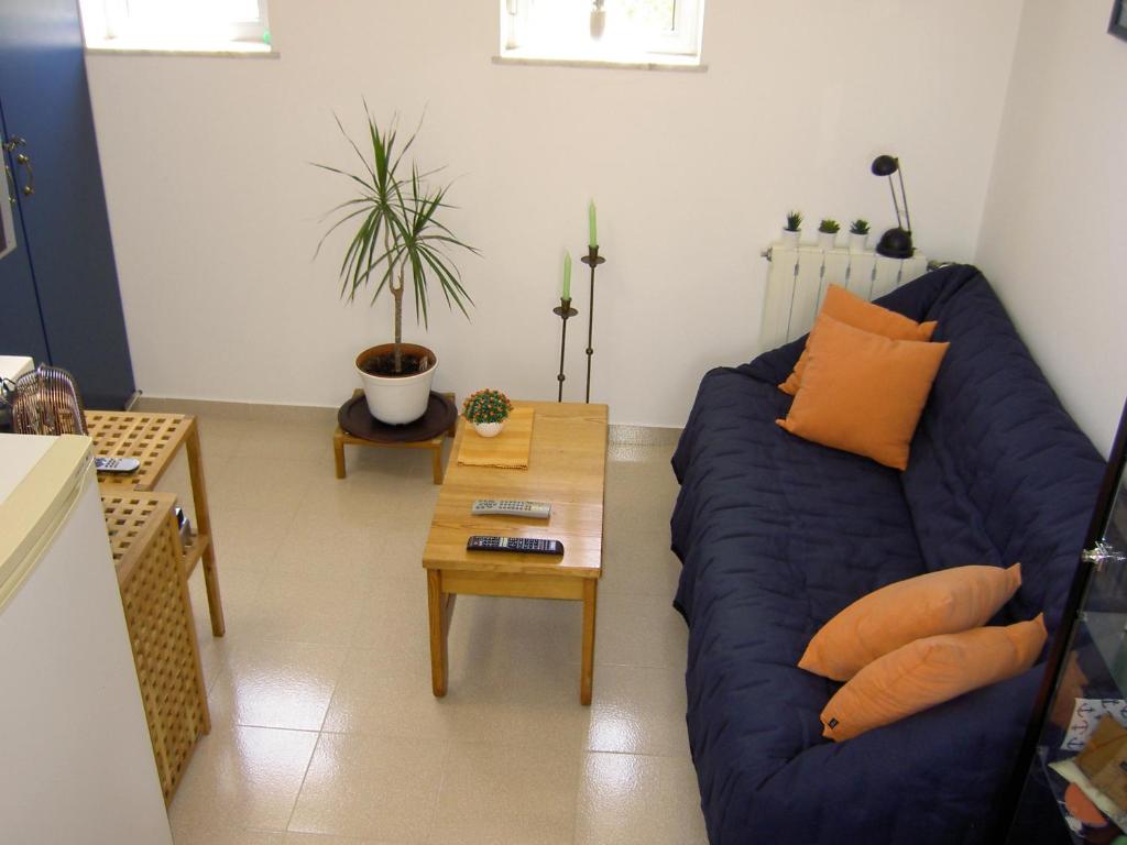 Posezení v ubytování Quartos Com Boas Vistas