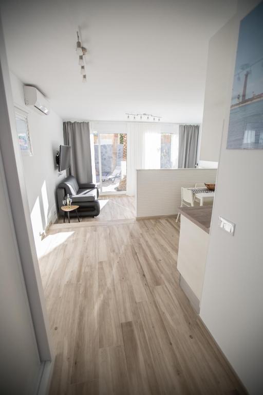 Posezení v ubytování Villa Jandia Modern new studio Morro Jable Private Cosy Garden and Parking