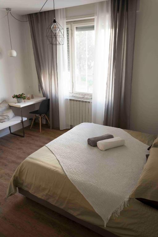 Postel nebo postele na pokoji v ubytování St. Peter's Luxury Rooms