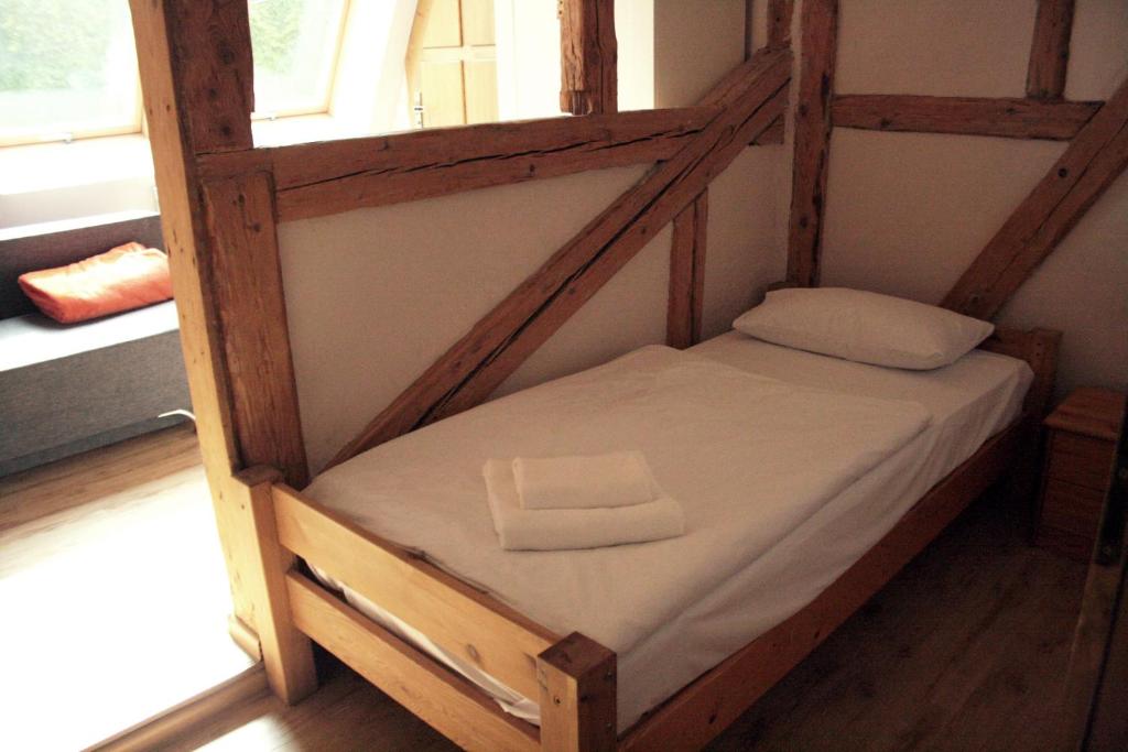 Postel nebo postele na pokoji v ubytování Karczma Bełty