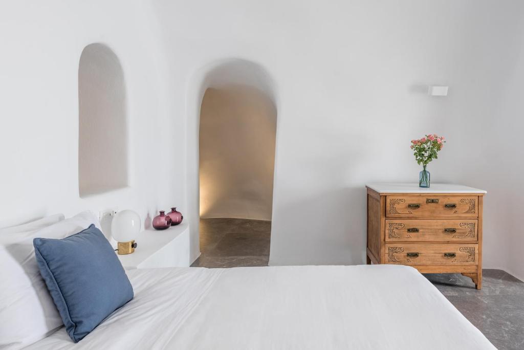 Postel nebo postele na pokoji v ubytování Chelidonia Luxury Suites