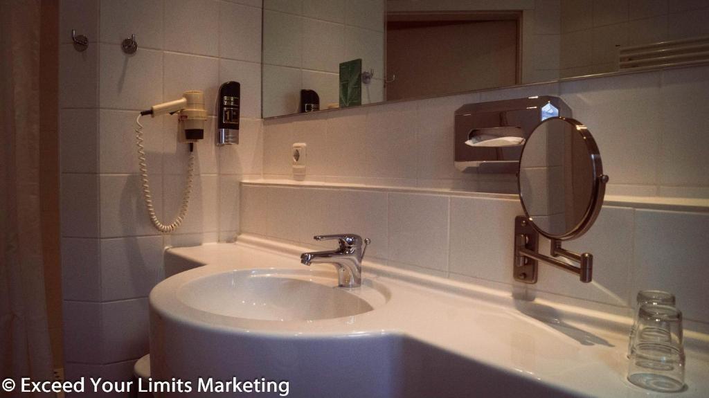 Vannituba majutusasutuses Hotel Zwei Länder