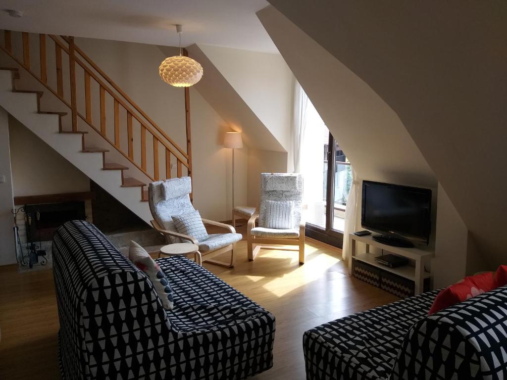 Posezení v ubytování Chamkoria Chalets