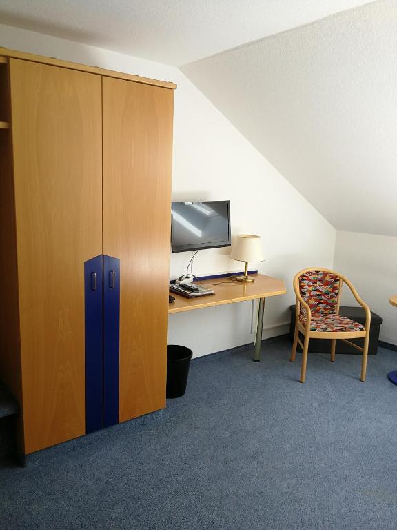 TV a/nebo společenská místnost v ubytování Hotel Sonne