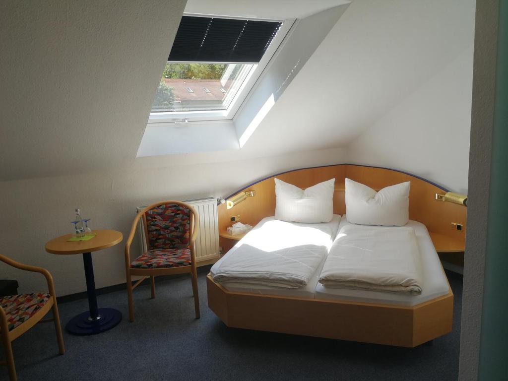 Postel nebo postele na pokoji v ubytování Hotel Sonne