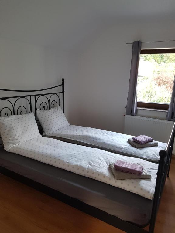 Postel nebo postele na pokoji v ubytování Apartma Katja