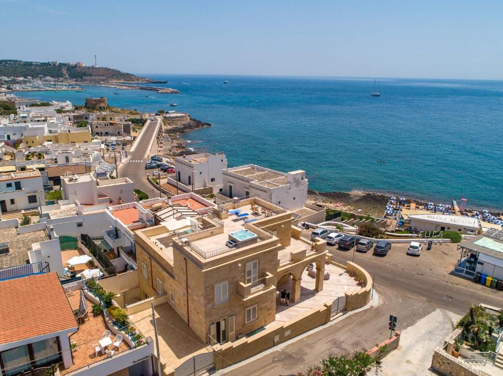 an aerial view of a town next to the ocean at Dimora Rizzo con tappeti di pietra in Leuca