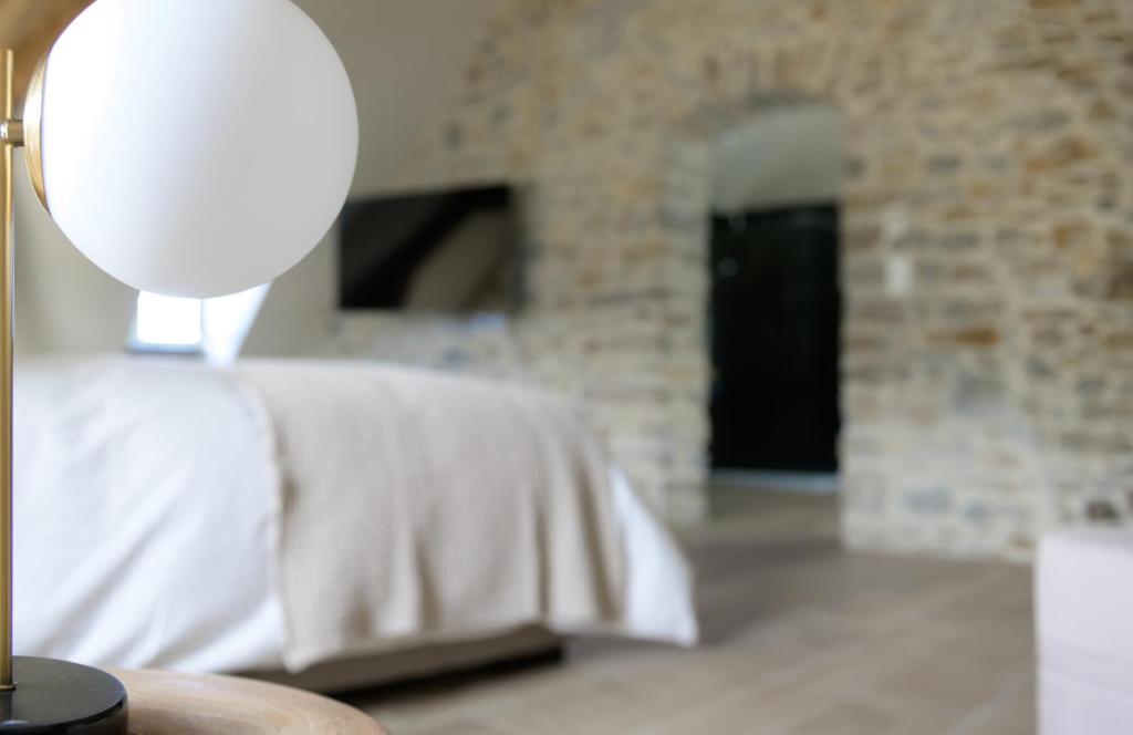 Postel nebo postele na pokoji v ubytování Couvent de la Salette & Spa