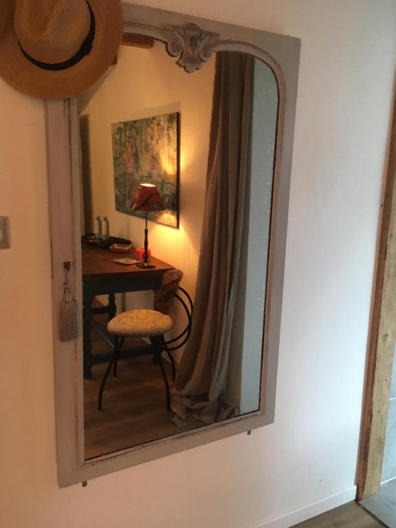 Postel nebo postele na pokoji v ubytování chambres d'hotes " Le Magnolia "