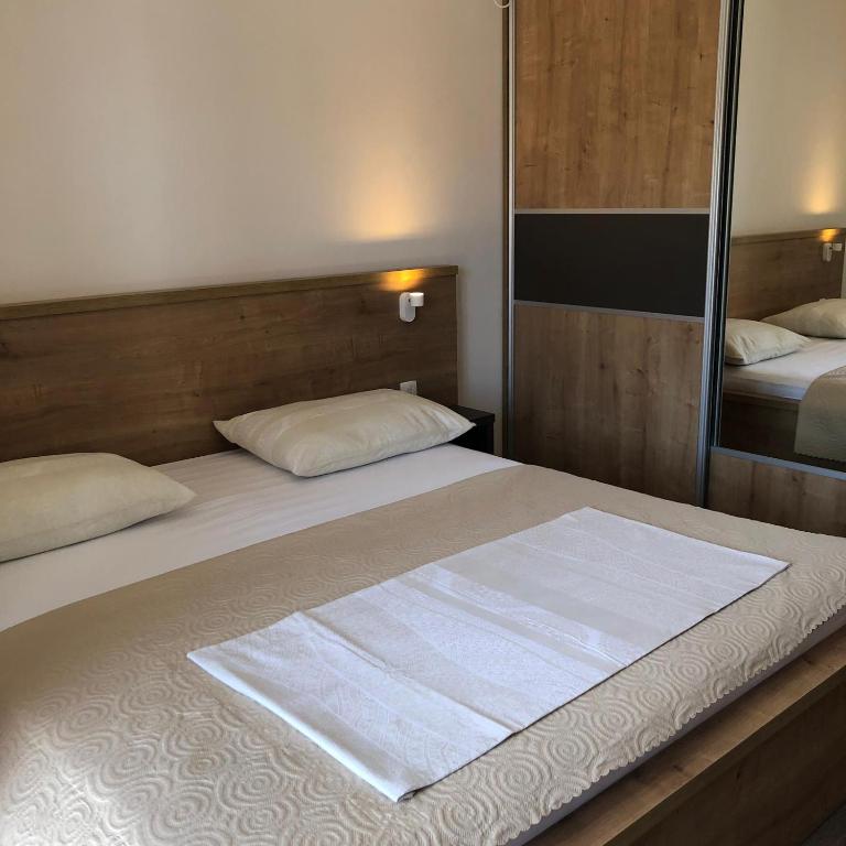 Posteľ alebo postele v izbe v ubytovaní Apartments Sea Vodice