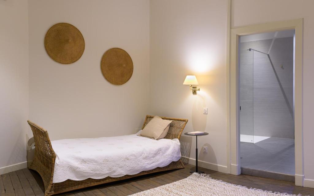 Postel nebo postele na pokoji v ubytování Couvent de la Salette & Spa