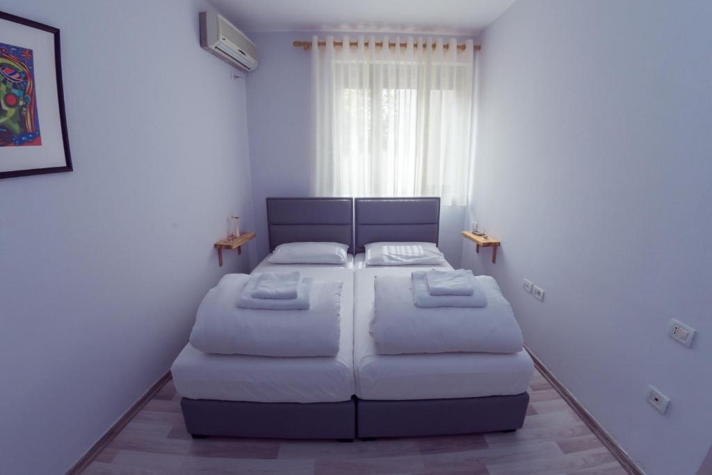 Postel nebo postele na pokoji v ubytování ART Hostel