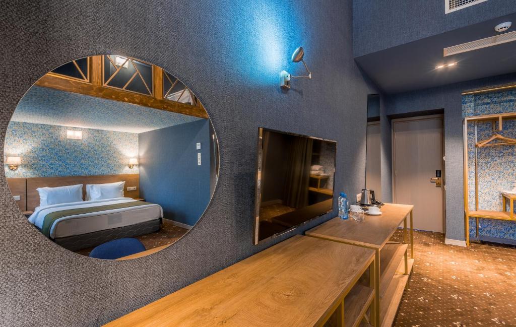 Postel nebo postele na pokoji v ubytování Gladius Inn Boutique Hotel by DNT Group