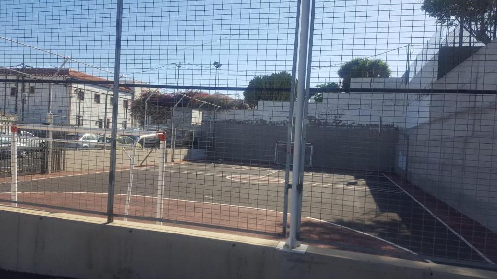 Tenis a/nebo squash v ubytování Acogedor apartamento en San Miguel de Abona nebo okolí
