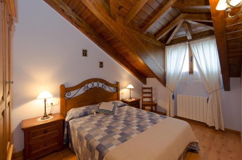 Postel nebo postele na pokoji v ubytování Apartamentos Casa Aneta