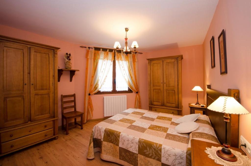 Postel nebo postele na pokoji v ubytování Apartamentos Casa Aneta