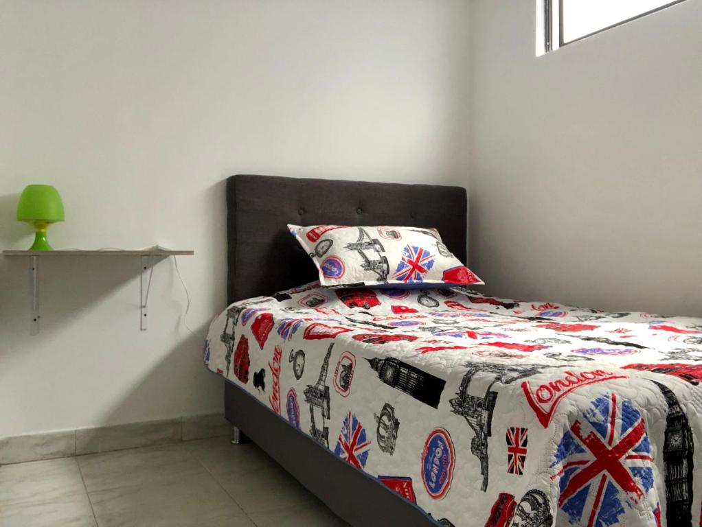 Postel nebo postele na pokoji v ubytování Aloha Hostel