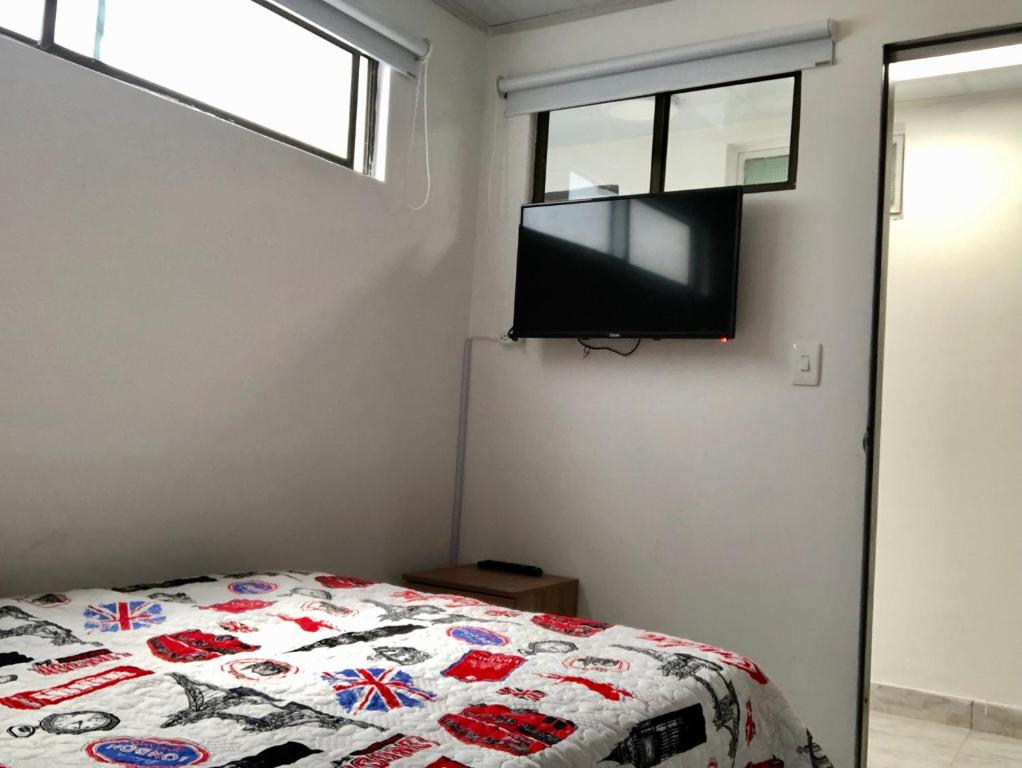 TV a/nebo společenská místnost v ubytování Aloha Hostel