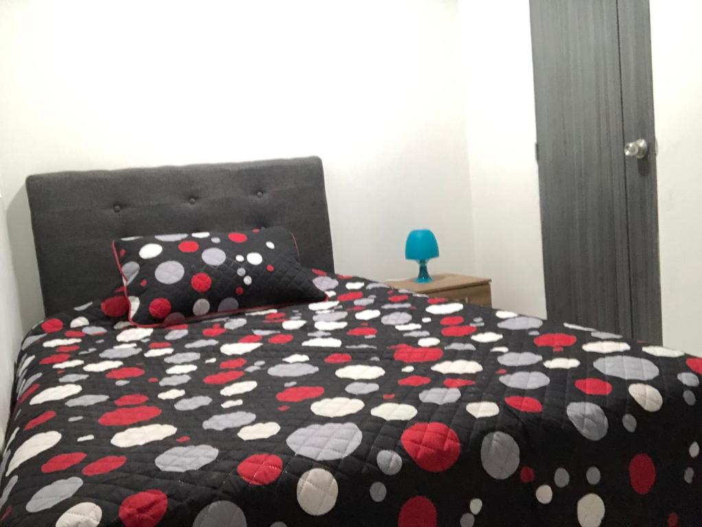 Postel nebo postele na pokoji v ubytování Aloha Hostel