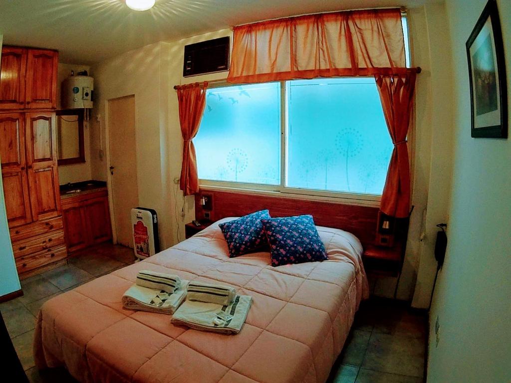 Cama o camas de una habitación en Cel Andino Malbec -Céntrico-