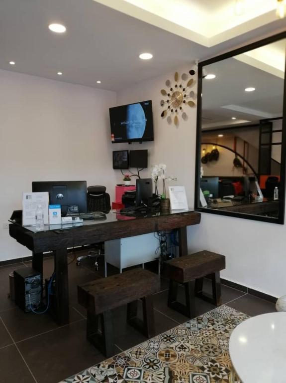 TV a/nebo společenská místnost v ubytování M Design Hotel @ Taman Pertama