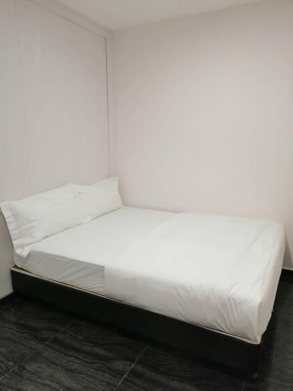 Postel nebo postele na pokoji v ubytování M Design Hotel @ Taman Pertama