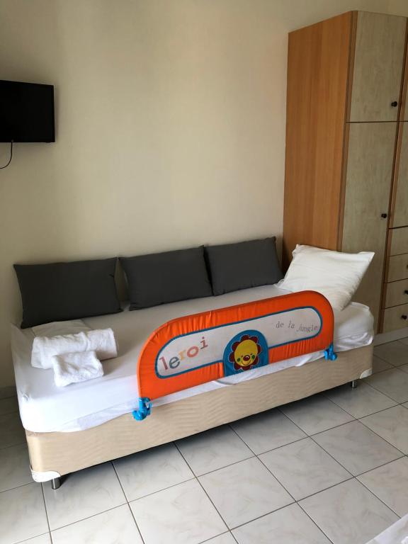 Postel nebo postele na pokoji v ubytování Iason Apartments