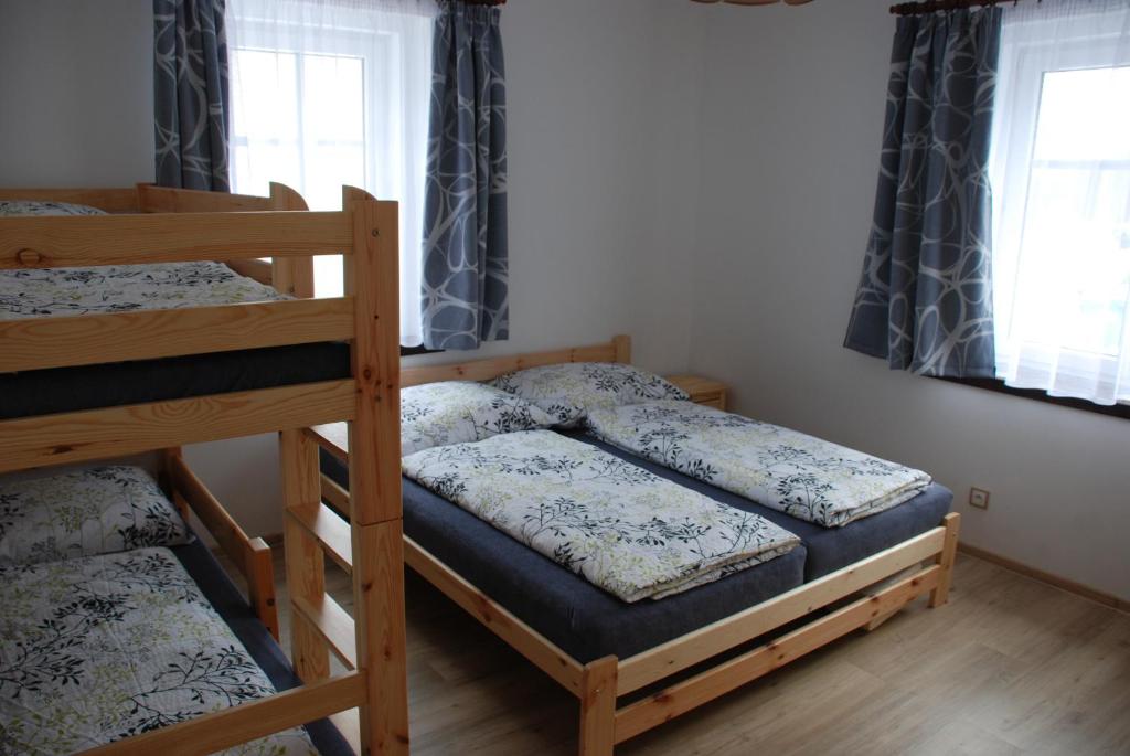 Postel nebo postele na pokoji v ubytování Apartmán Raketa