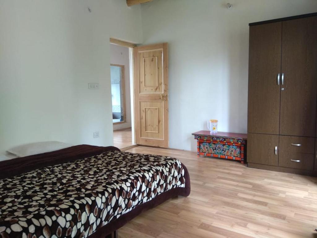 Postel nebo postele na pokoji v ubytování Chosdup Guest House