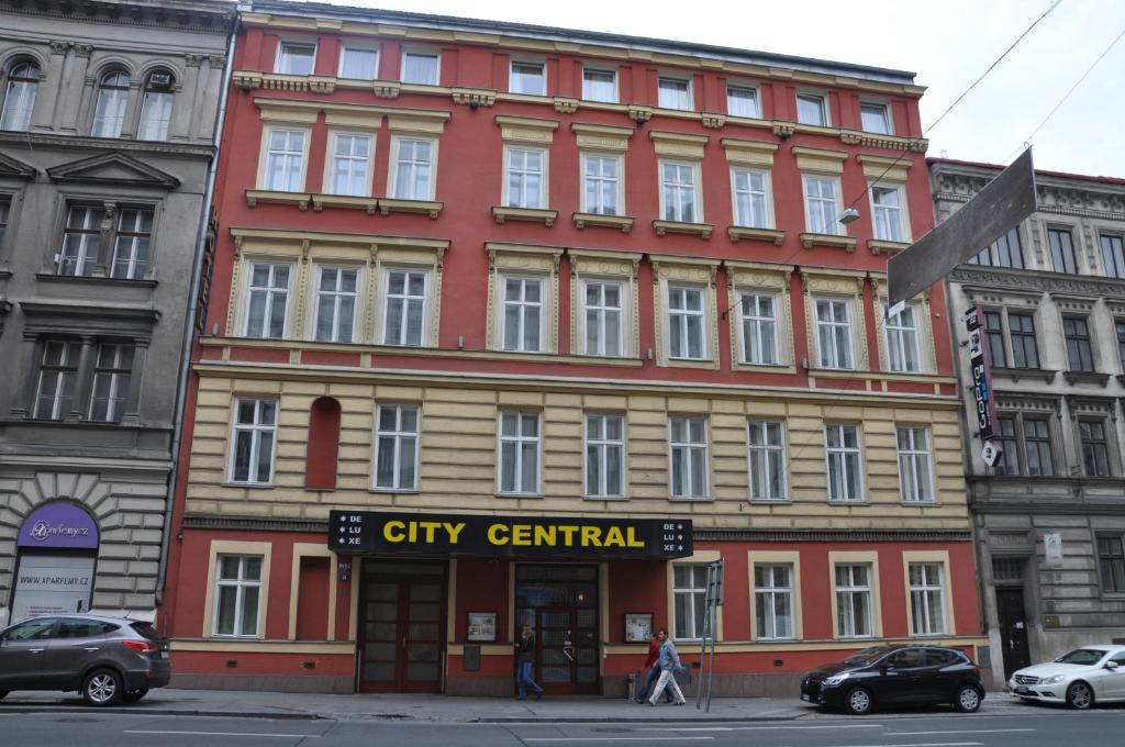 a city central building on the corner of a street at City Central De Luxe in Prague