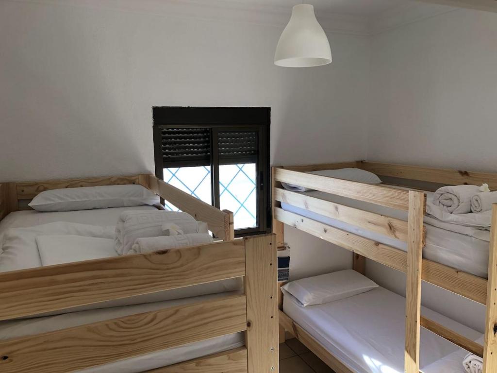 Posteľ alebo postele v izbe v ubytovaní El Chalet