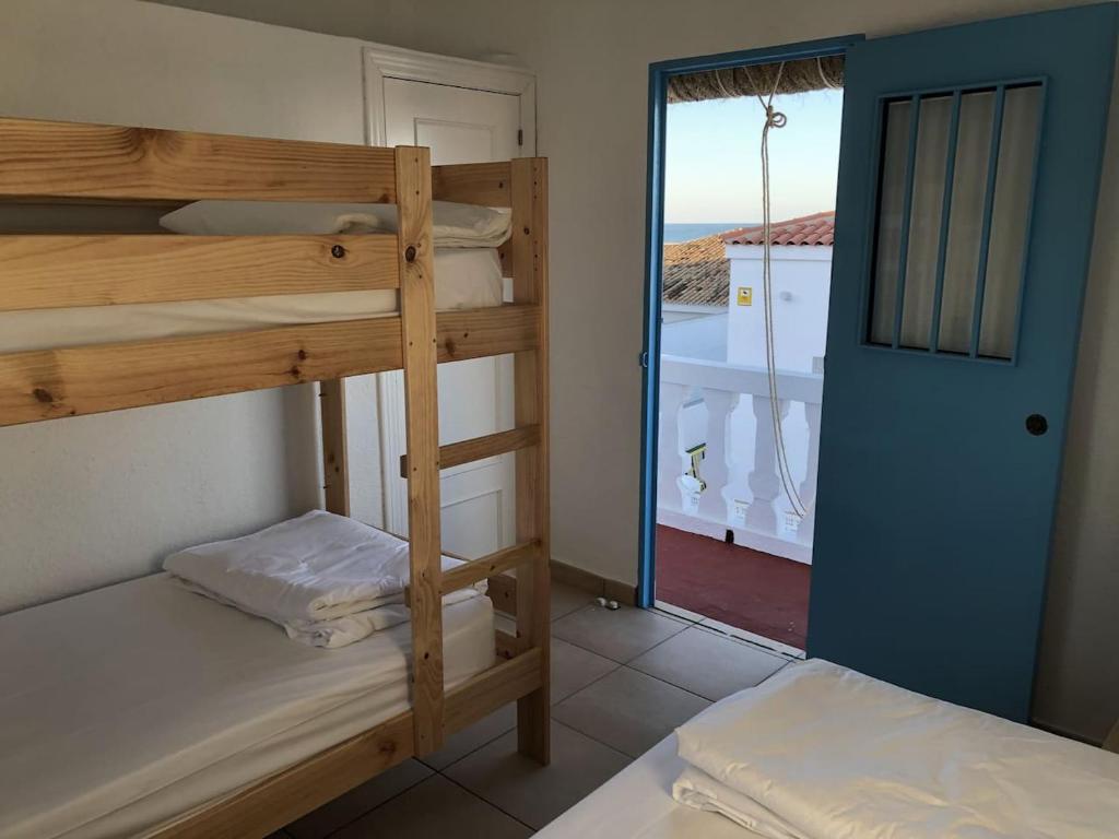 Posteľ alebo postele v izbe v ubytovaní El Chalet