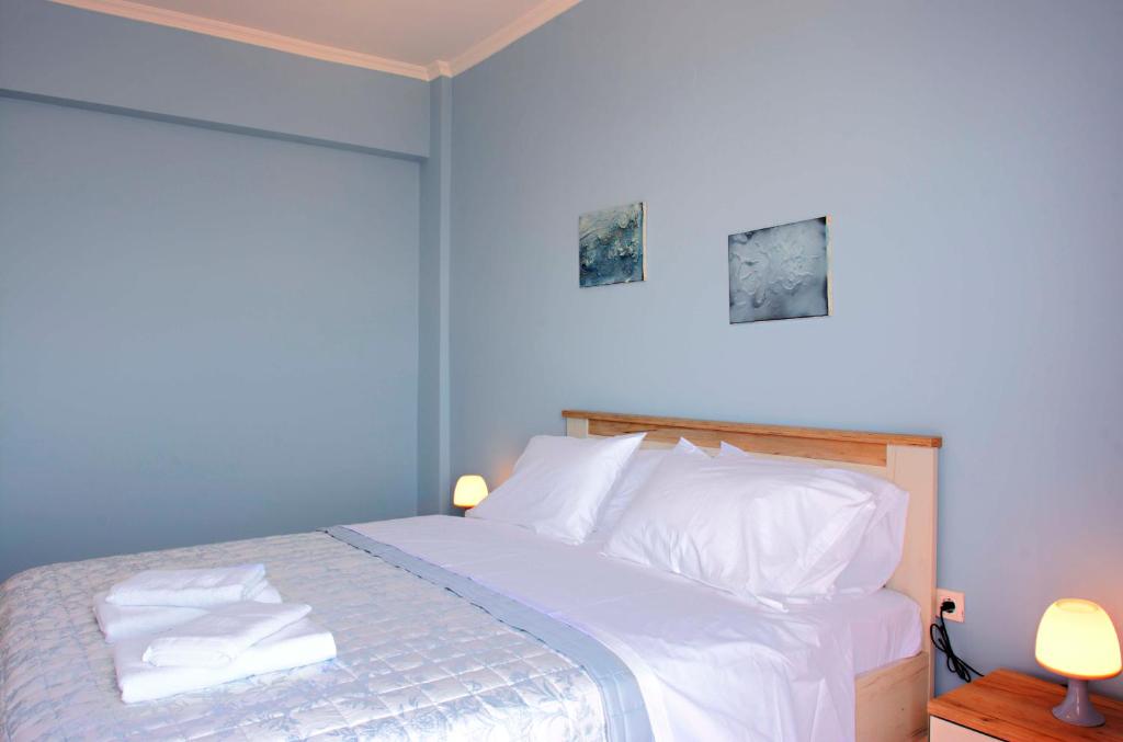 Postel nebo postele na pokoji v ubytování T8 APARTMENT ON THE BEACH
