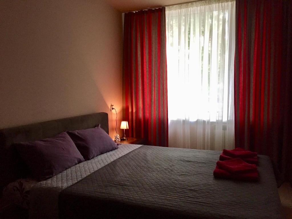 Postel nebo postele na pokoji v ubytování Westend Hotel Kyiv
