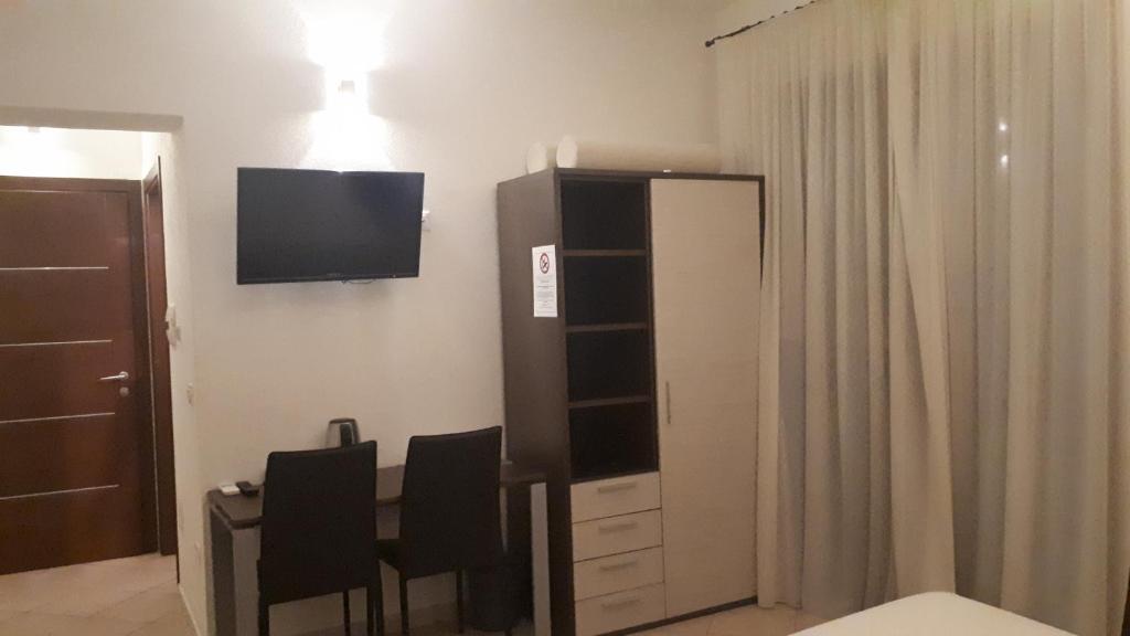 TV a/nebo společenská místnost v ubytování Domo - Guest-House Il Nespolo Fiorito