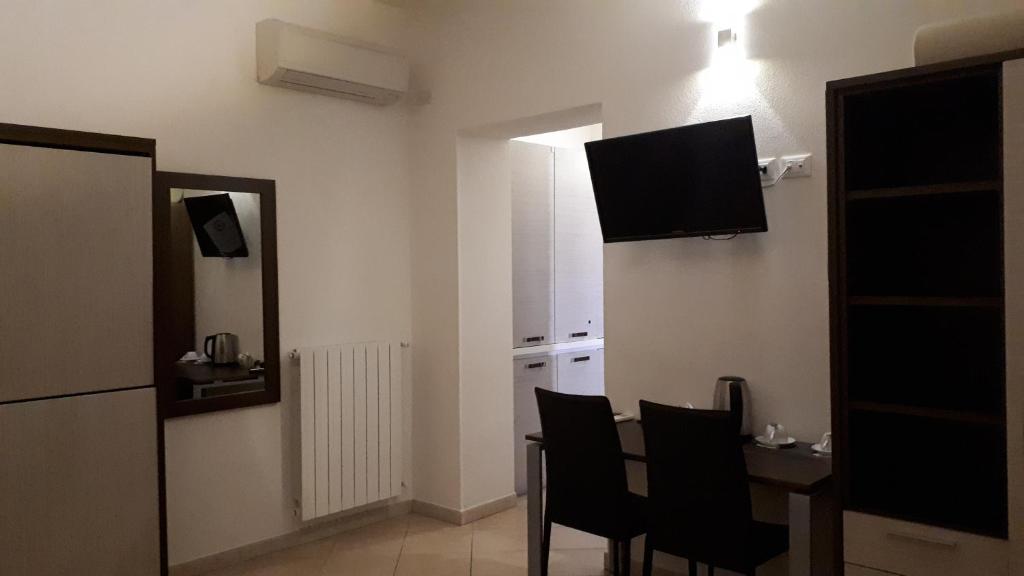 TV a/nebo společenská místnost v ubytování Domo - Guest-House Il Nespolo Fiorito