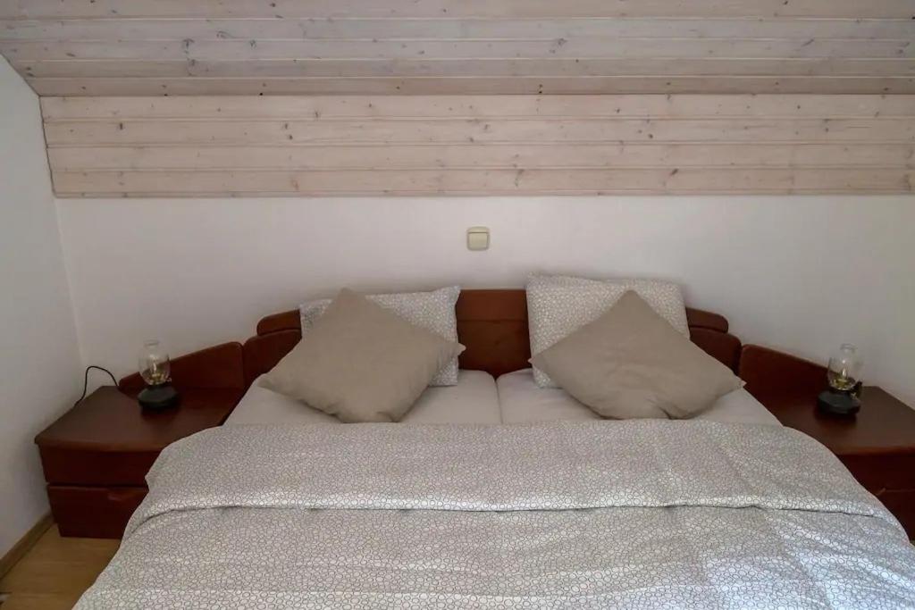 Postel nebo postele na pokoji v ubytování Chalet Mia - Family Cottage, Kranjska Gora