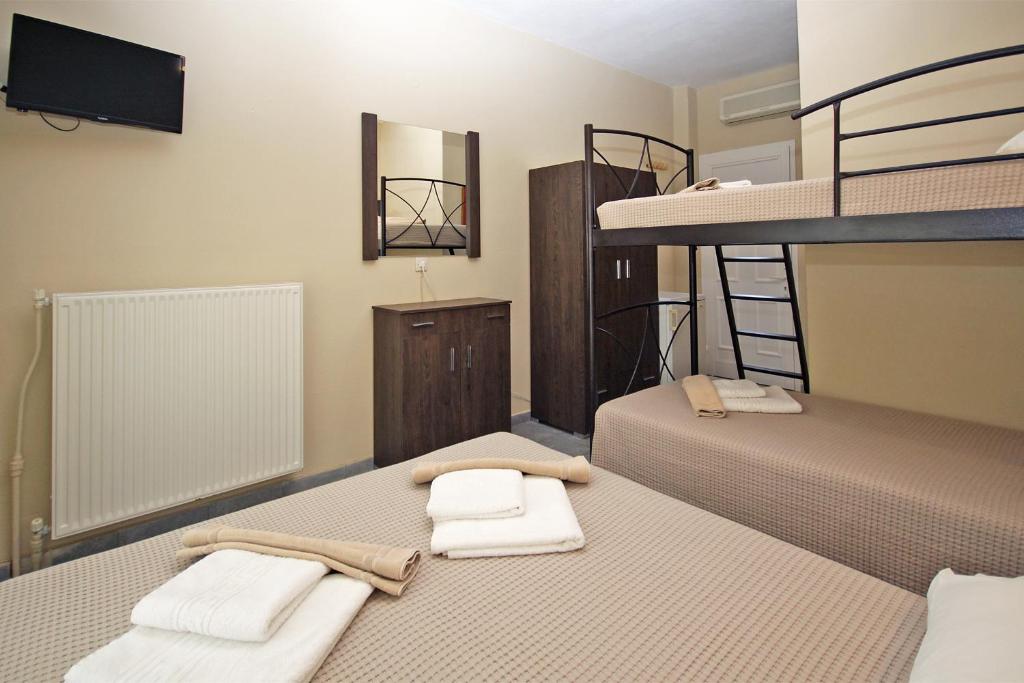 Postel nebo postele na pokoji v ubytování FunBeach Rooms