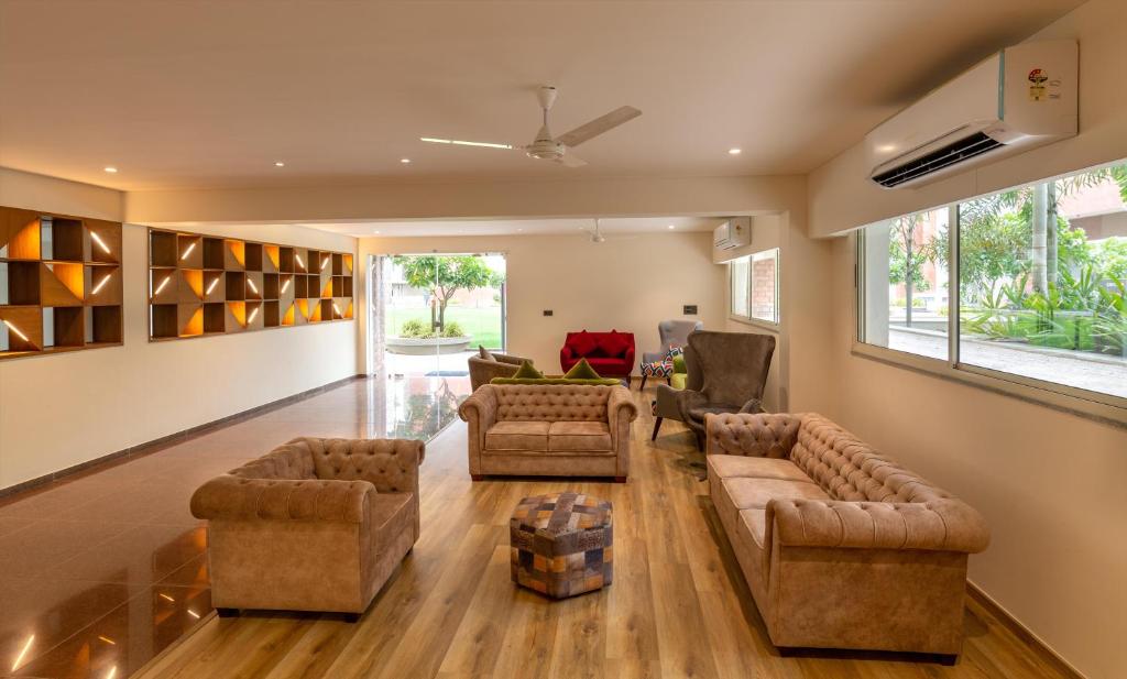 Posezení v ubytování Siara Styles Amba Suites, Gandhinagar