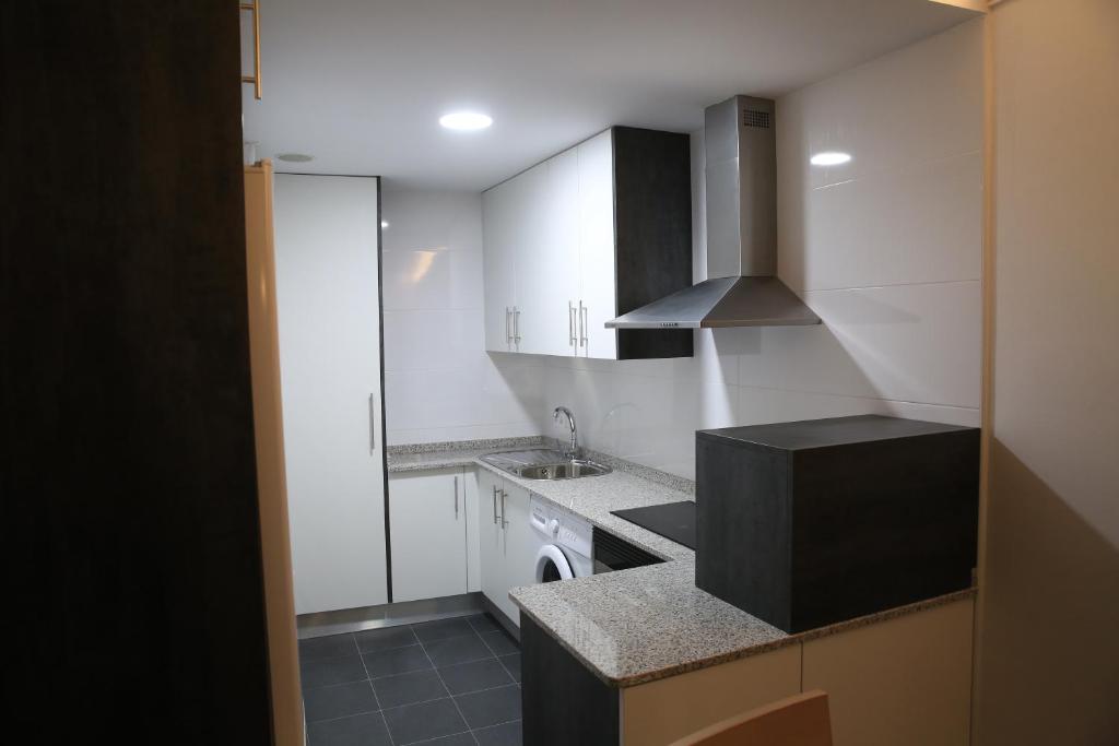 Kuchyňa alebo kuchynka v ubytovaní APARTAMENTOS LA VEREDA