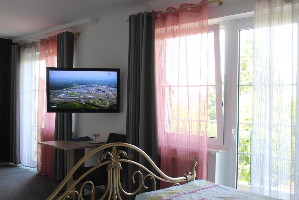TV a/nebo společenská místnost v ubytování Das Mittelpunkt
