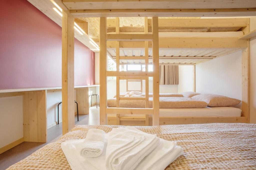Postel nebo postele na pokoji v ubytování Sport- und Ferienhaus Don Bosco