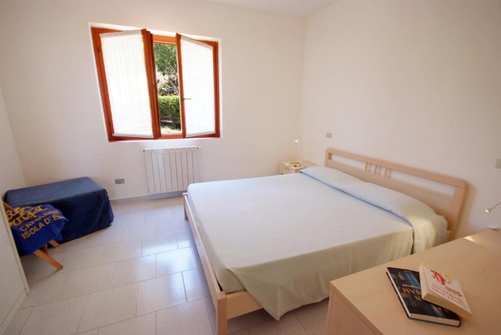 Posteľ alebo postele v izbe v ubytovaní Casa Del Golfo