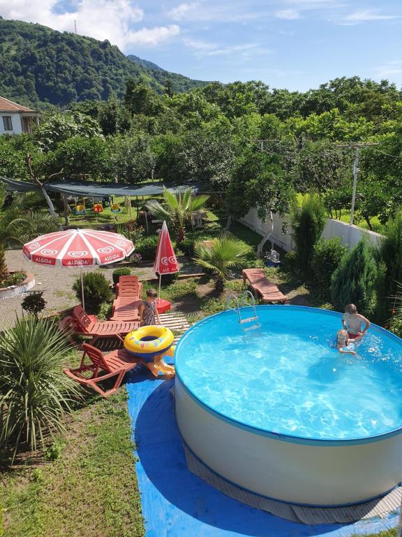 Bazén v ubytování Twins Hotel nebo v jeho okolí
